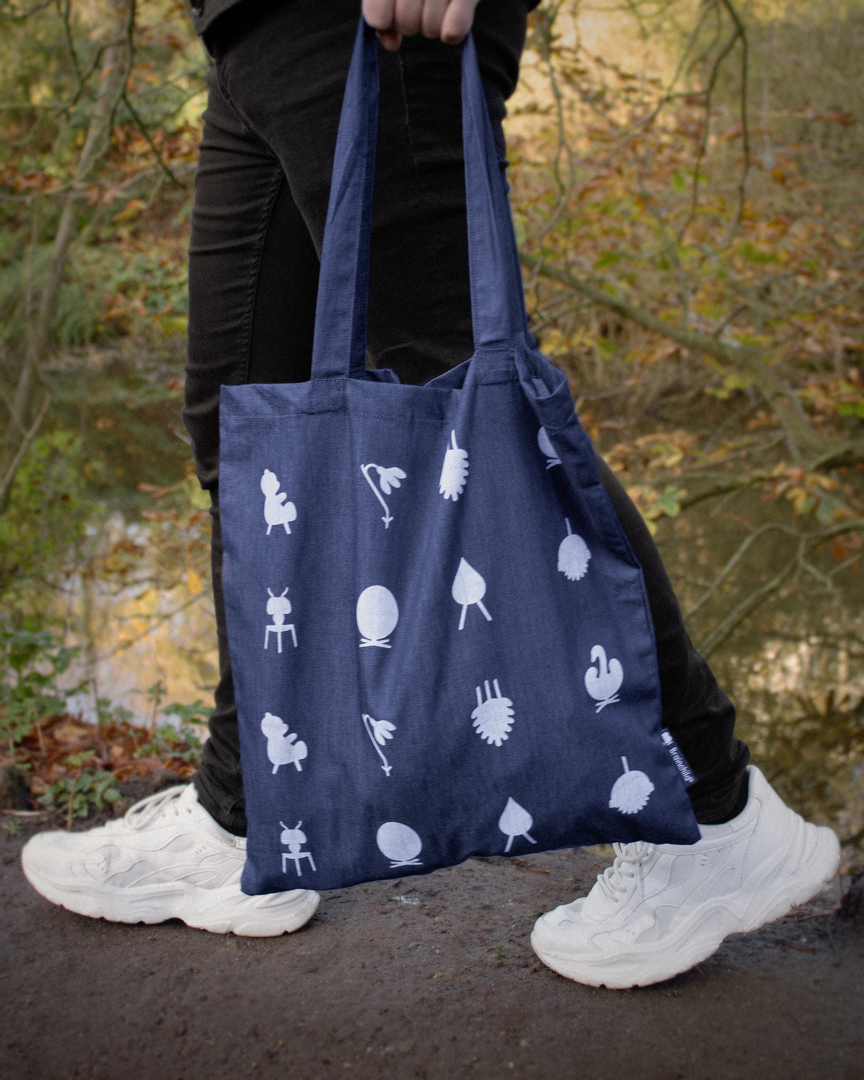Ikony projektowania pomysłu przewożącego torbę, niebieski